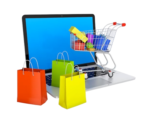 A laptop with a blue screen, a miniature shopping cart filled with colorful boxes on the keyboard, and three colorful shopping bags in front, representing online shopping.